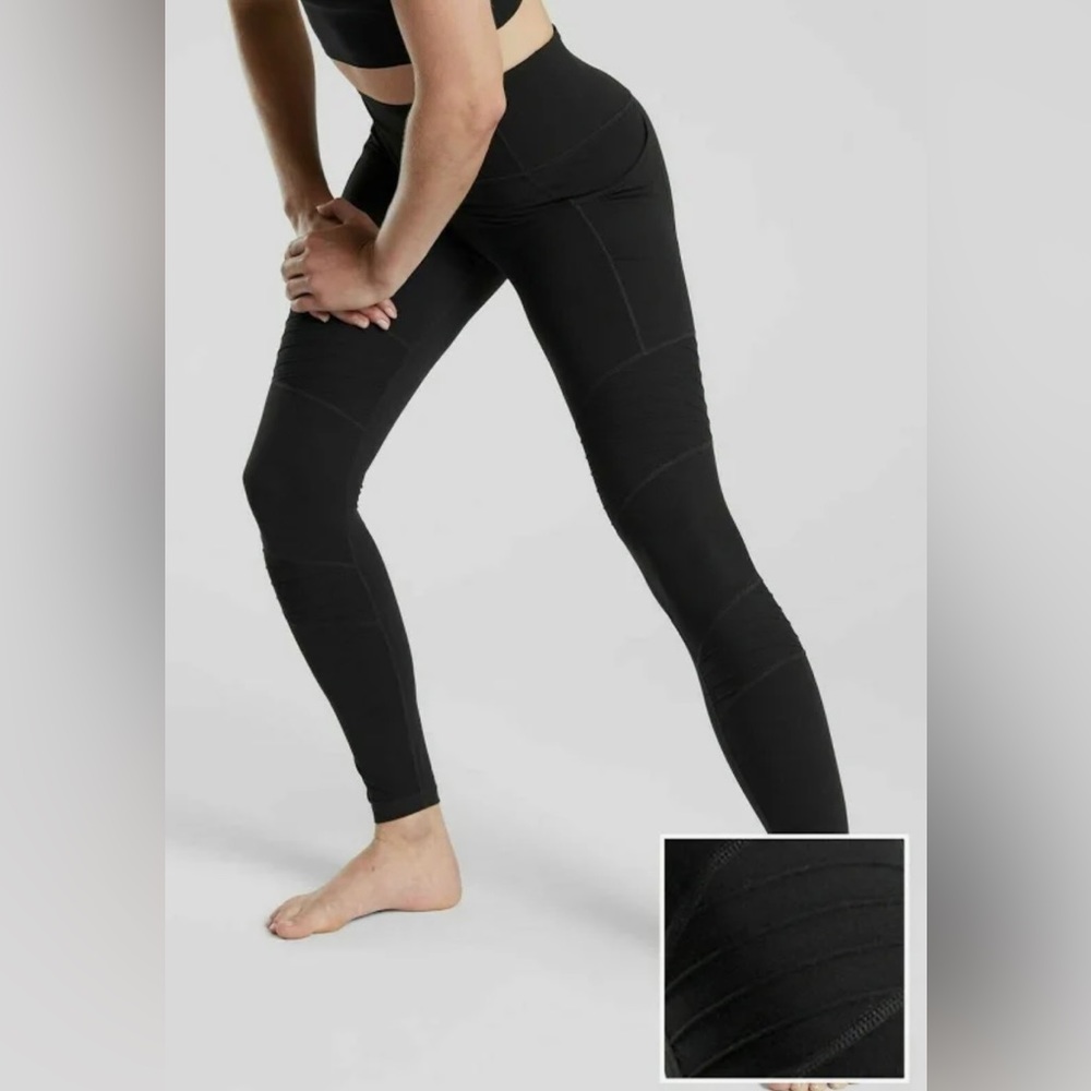 Athleta size Small black Inclination Motto leggings with side pockets.